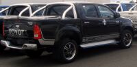 Крышка из ABS с дугами на багажнике - Toyota Hilux (2005 - 2011 - 2015)